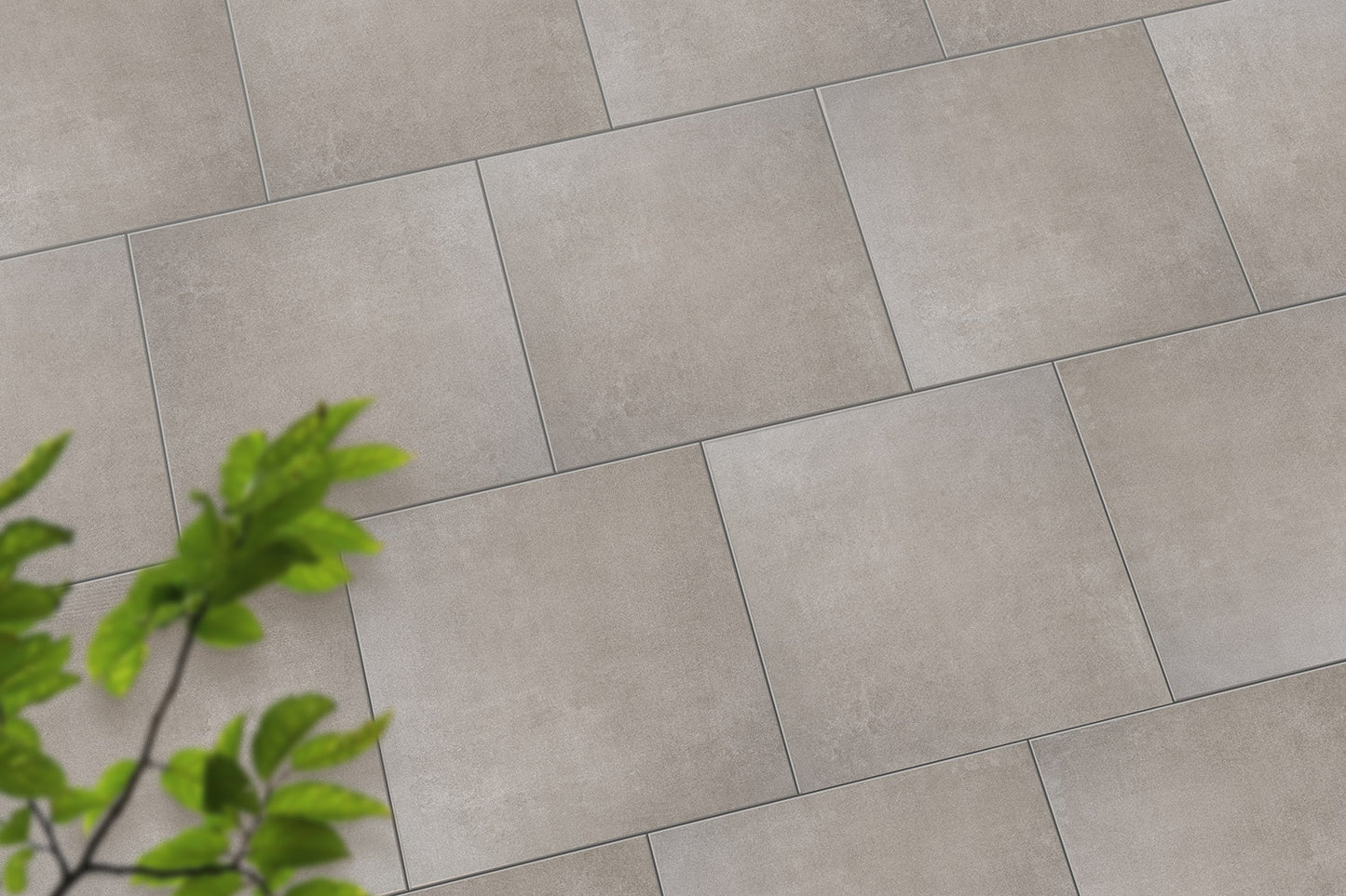 Verlegte CeramicLine³-Platten in grau von Woehe & Heydemann in 60x60 – Beton-Optik mit harmonischer Linienführung 