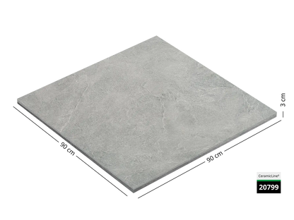 Saubere Schnittkante der 90x90 Terrassenplatte in grauer Naturstein-Optik von Woehe & Heydemann mit keramischer Oberfläche