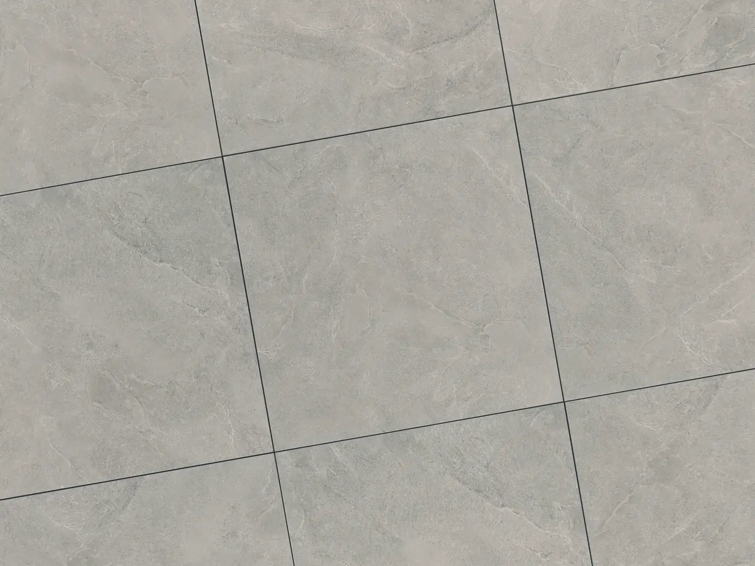 Verlegte CeramicLine³-Platten in grau von Woehe & Heydemann in 90x90. Naturstein-Optik mit harmonischer Linienführung.