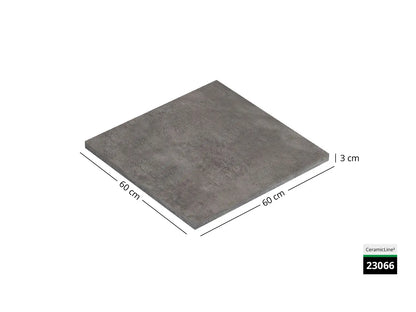 Saubere Schnittkante der 60x60 Terrassenplatte in grauer Betonoptik von Woehe & Heydemann mit feinkörniger Oberfläche  