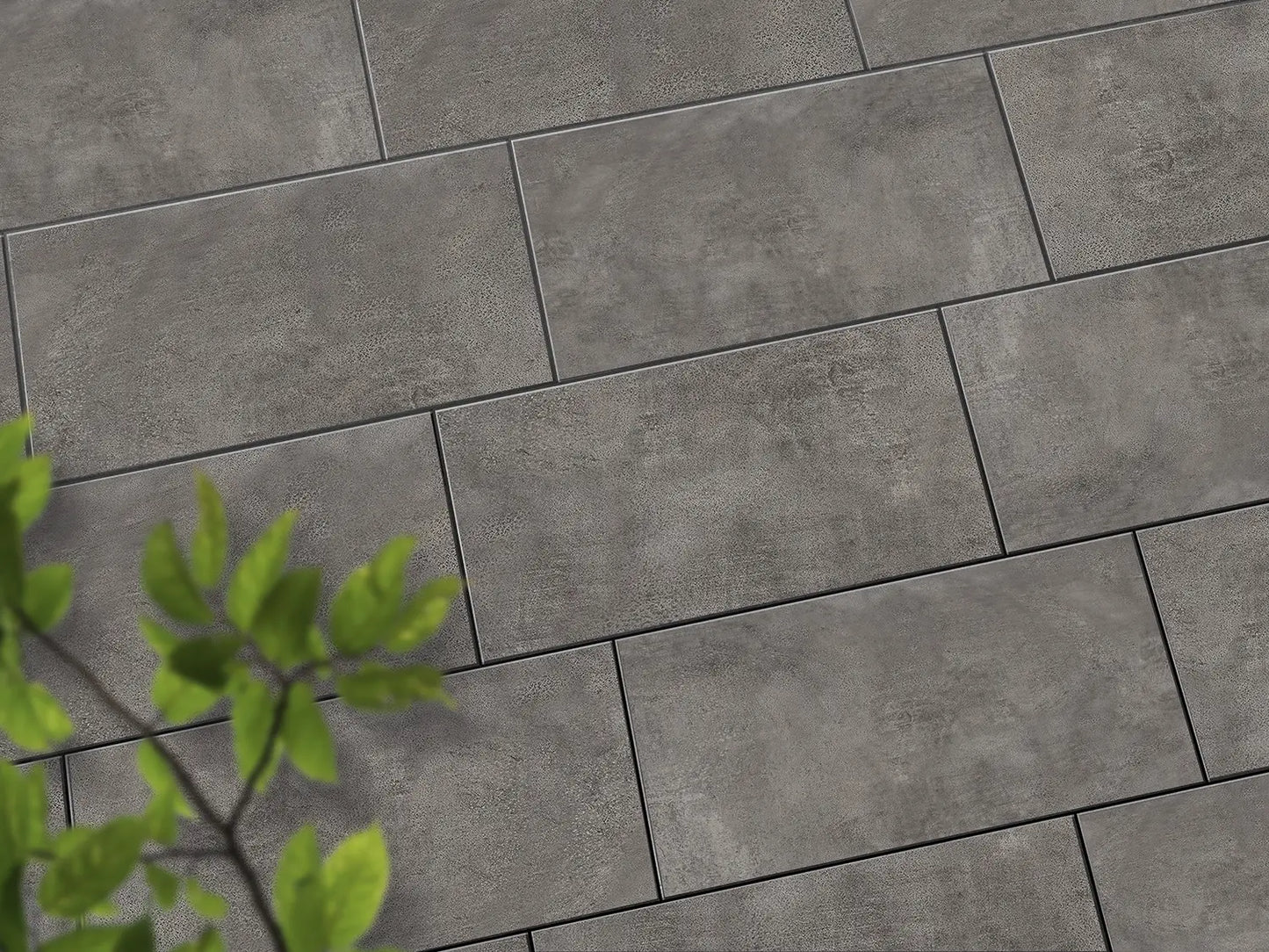 Verlegte CeramicLine³-Platten in grau von Woehe & Heydemann in 80x40 – Beton-Optik mit harmonischer Linienführung 