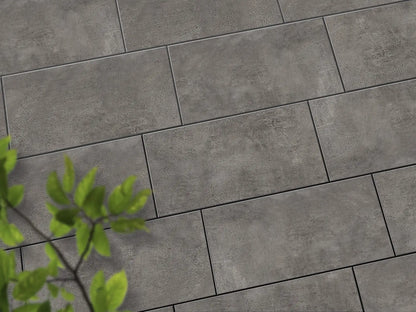 Verlegte CeramicLine³-Platten in grau von Woehe & Heydemann in 80x40 – Beton-Optik mit harmonischer Linienführung 