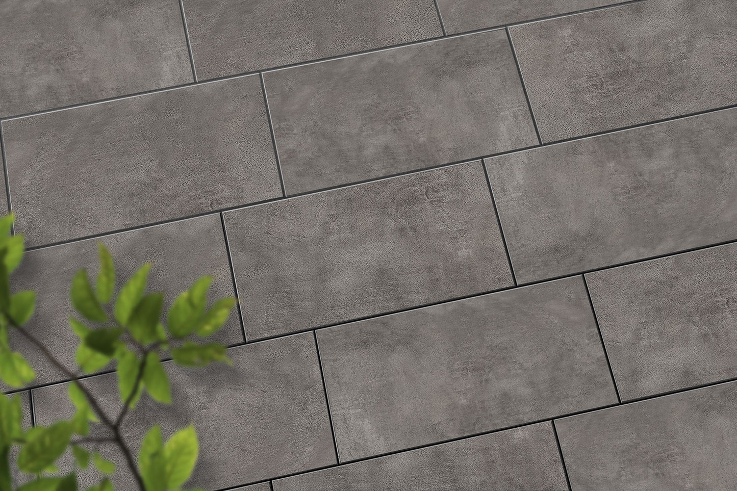 Verlegte CeramicLine³-Platten in grau von Woehe & Heydemann in 80x40 – Naturstein-Optik mit harmonischer Linienführung 