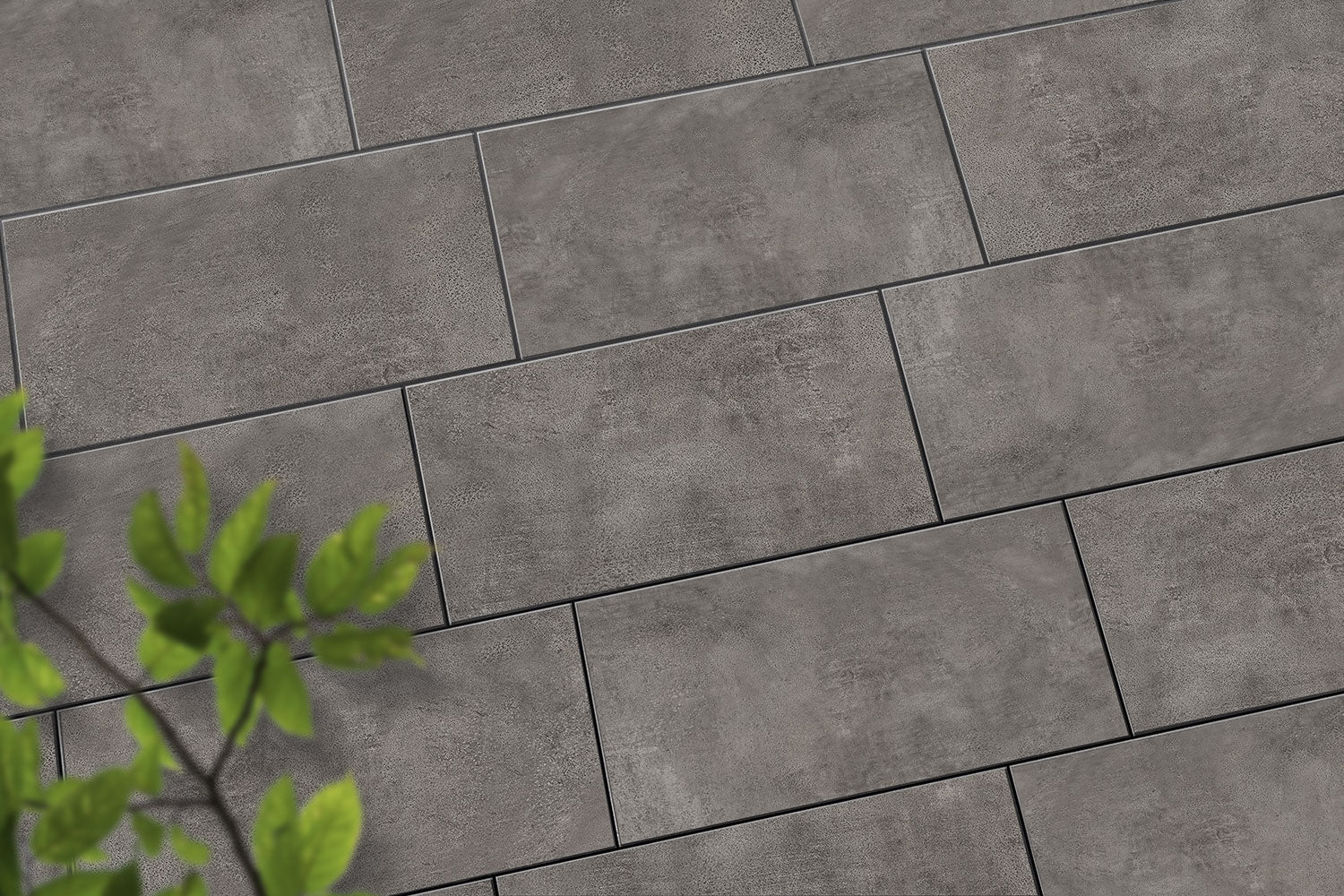 Verlegte CeramicLine³-Platten in grau von Woehe & Heydemann in 80x40 – Naturstein-Optik mit harmonischer Linienführung 