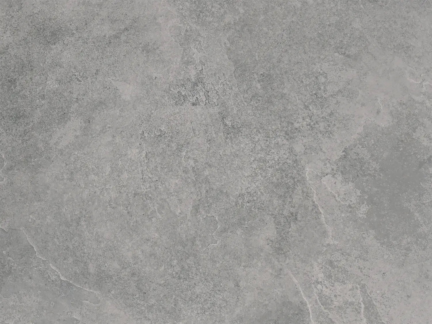 CeramicLine²-Terrassenplatte in grauer Naturstein-Optik von Woehe & Heydemann mit feiner Oberfläche