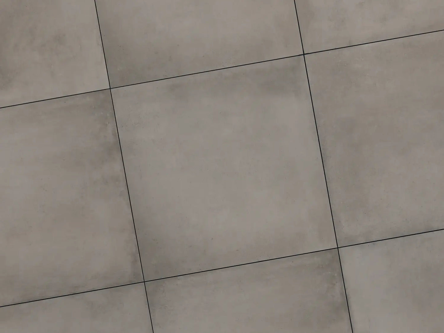 Verlegte CeramicLine²-Platten in grau von Woehe & Heydemann in 100x100 – Beton-Optik mit harmonischer Linienführung