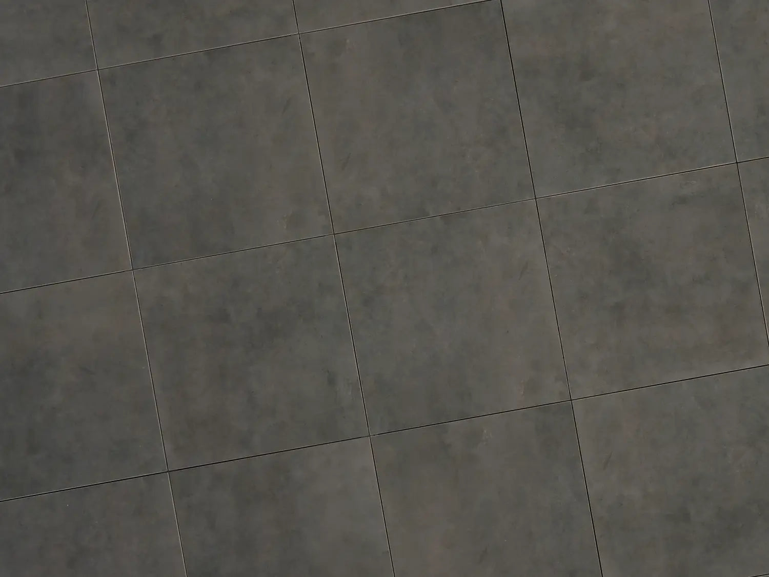 Verlegte CeramicLine²-Platten in anthrazit von Woehe & Heydemann in 60x60. Beton-Optik mit harmonischer Linienführung.