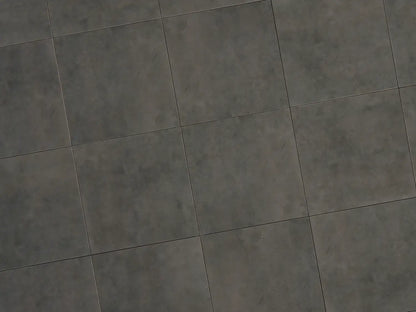 Verlegte CeramicLine²-Platten in anthrazit von Woehe & Heydemann in 60x60. Beton-Optik mit harmonischer Linienführung.