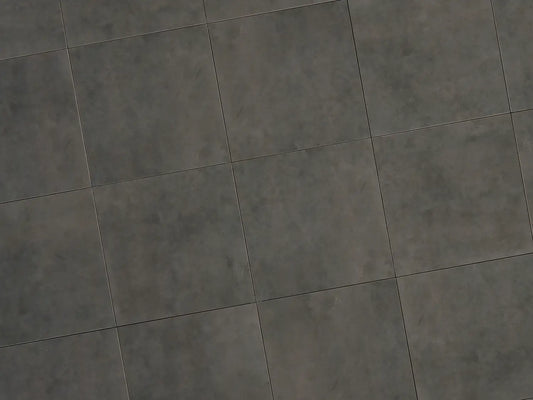 Verlegte CeramicLine²-Platten in anthrazit von Woehe & Heydemann in 60x60. Beton-Optik mit harmonischer Linienführung.