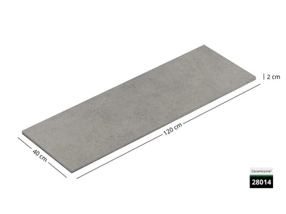 Saubere Schnittkante der 120x40 Terrassenplatte in grauer Natursteinoptik von Woehe & Heydemann mit Beton Oberfläche 