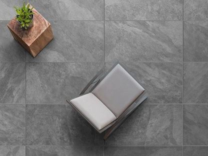 120x60 CeramicLine²-Terrassenplatten in grauer Natursteinoptik von Woehe & Heydemann verlegt auf einer modernen Terrasse 