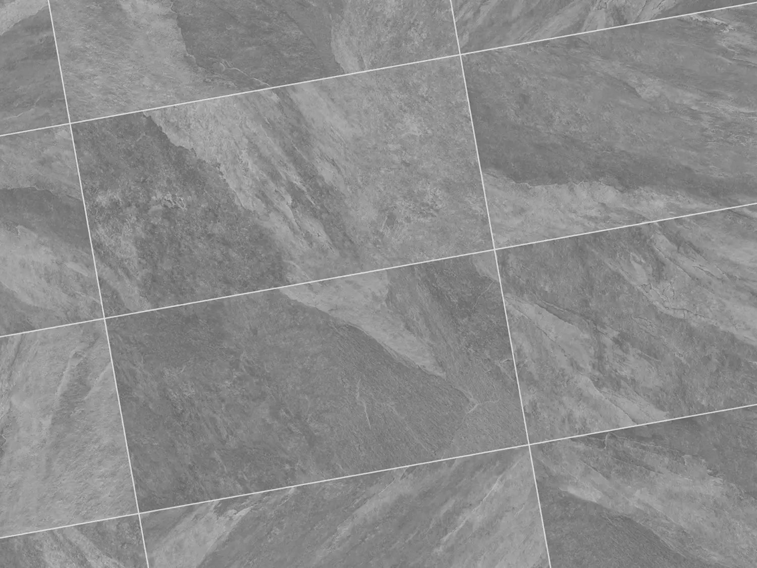 120x60 CeramicLine²-Terrassenplatten in grauer Natursteinoptik von Woehe & Heydemann verlegt auf einer modernen Terrasse 