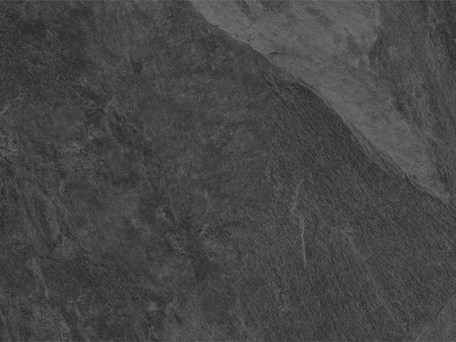 CeramicLine²-Terrassenplatte in grauer Naturstein-Optik von Woehe & Heydemann mit feiner Oberfläche