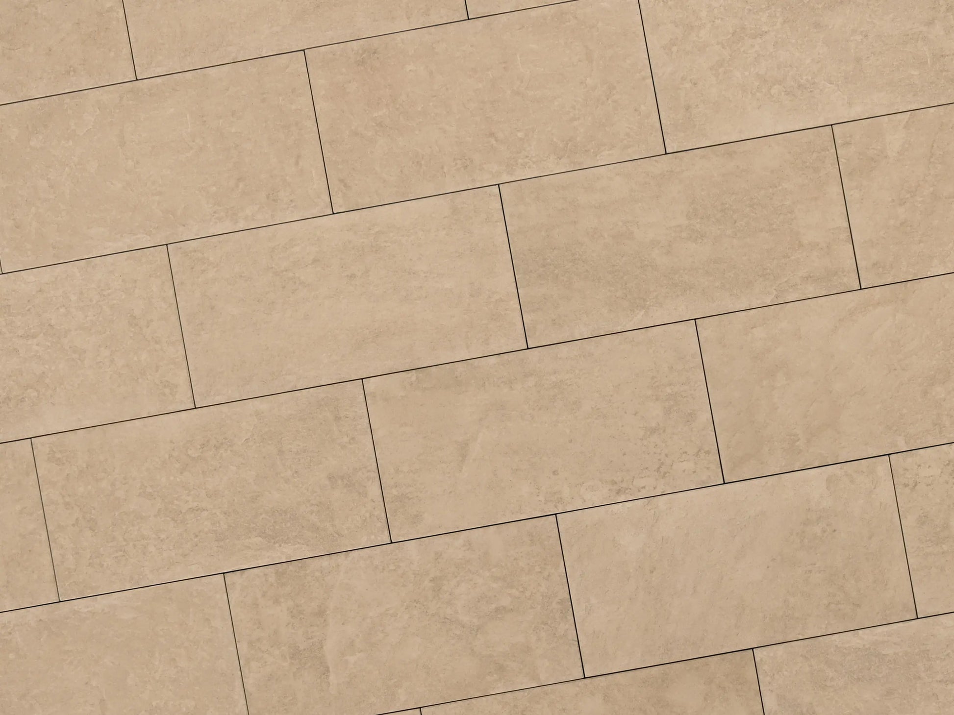 Verlegte NanoLine-Platten in beige von Woehe & Heydemann in 40x80. Naturstein-Optik mit harmonischer Linienführung.