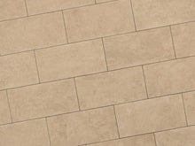 Verlegte NanoLine-Platten in beige von Woehe & Heydemann in 40x80. Naturstein-Optik mit harmonischer Linienführung.