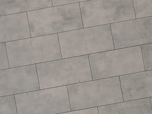 Verlegte NanoLine-Platten in grau von Woehe & Heydemann in 40x80. Beton-Optik mit harmonischer Linienführung.