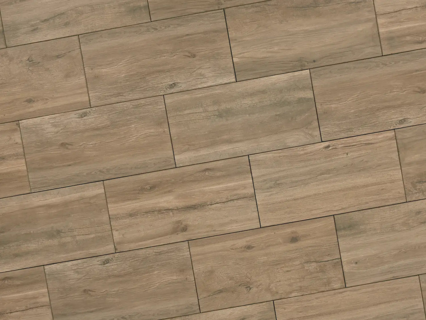 Verlegte NanoLine-Platten in grau von Woehe & Heydemann in 40x80. Holz-Optik mit harmonischer Linienführung.