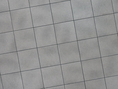 Verlegte PremiumLine-Platten in grau von Woehe & Heydemann in 40x40 – Naturstein-Optik mit harmonischer Linienführung 