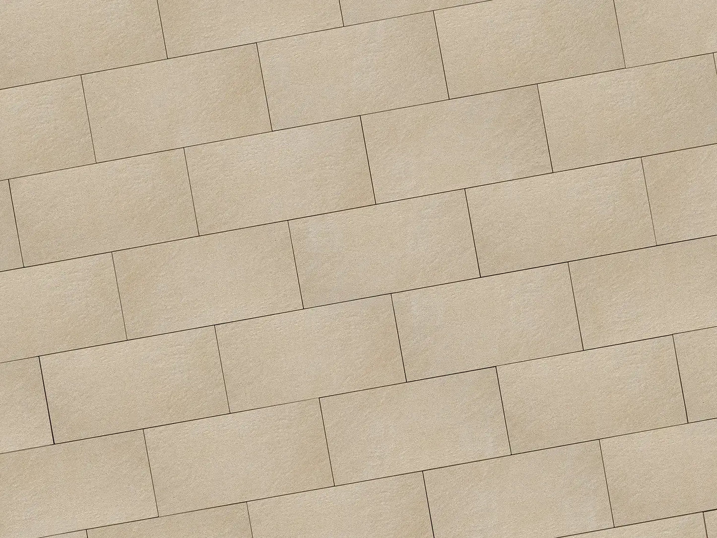 Verlegte NanoLine-Platten in beige von Woehe & Heydemann in 60x30 – Naturstein-Optik mit harmonischer Linienführung 