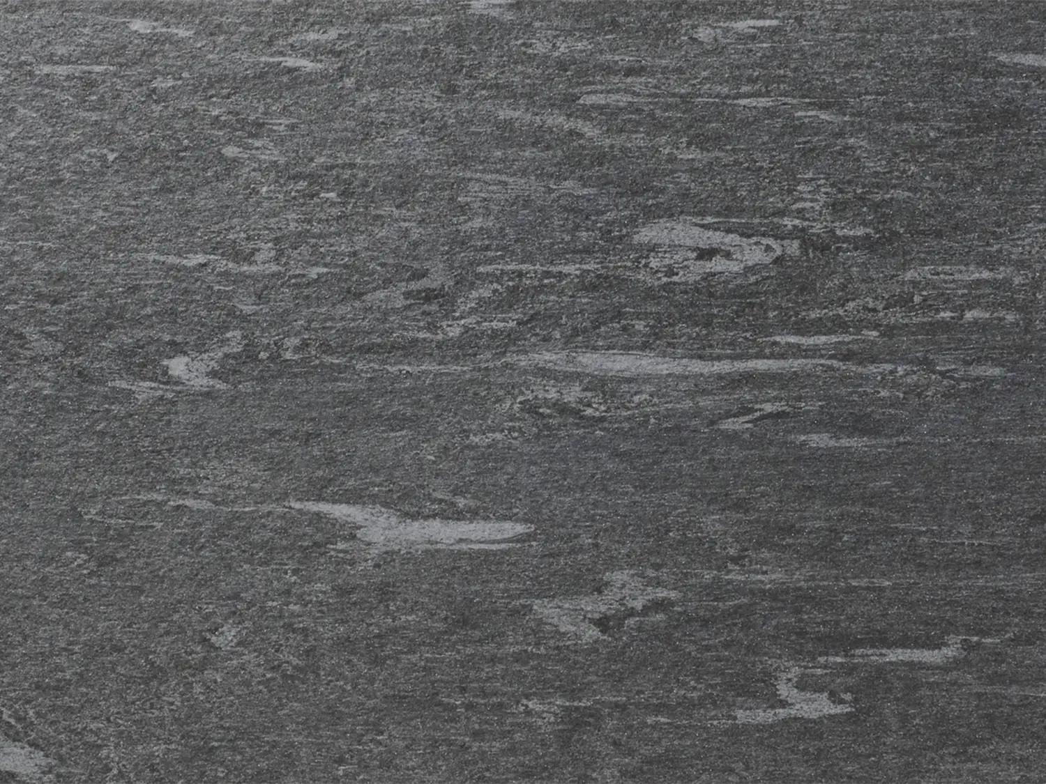 CeramicLine²-Terrassenplatte in grauer Naturstein-Optik von Woehe & Heydemann mit feiner Oberfläche